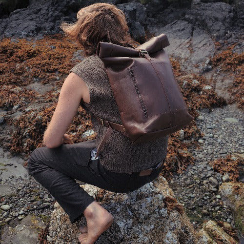 minimalist dark brown leather rolltop backpack