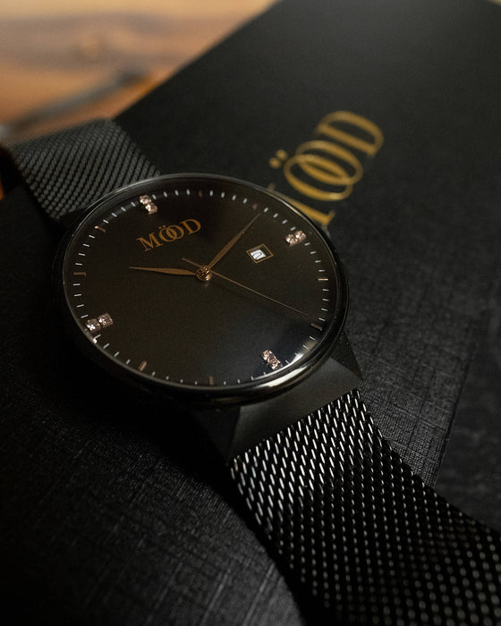 Montre pop's en acier inoxydable tissé noir