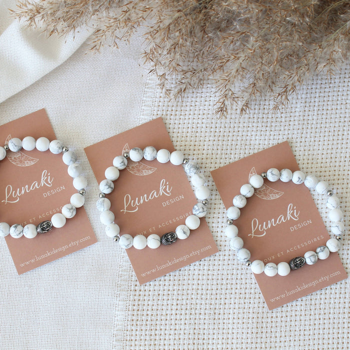 Marbre - bracelet en pierres semi-précieuses pour femmes et hommes: howlite mat et breloque bouddha en acier inoxydable