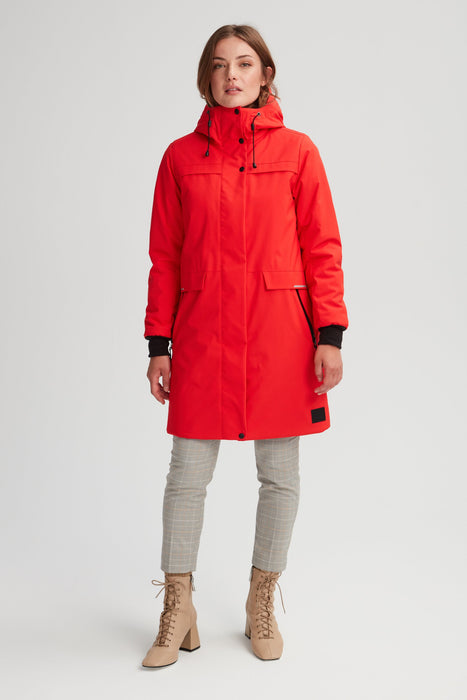 Manteau d'hiver couleur rouge pour femme. Manteau avec bandes réfléchissantes fabriqué au Québec.
