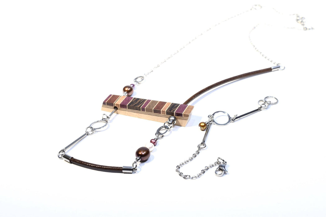 Collier balançoire perles et bois