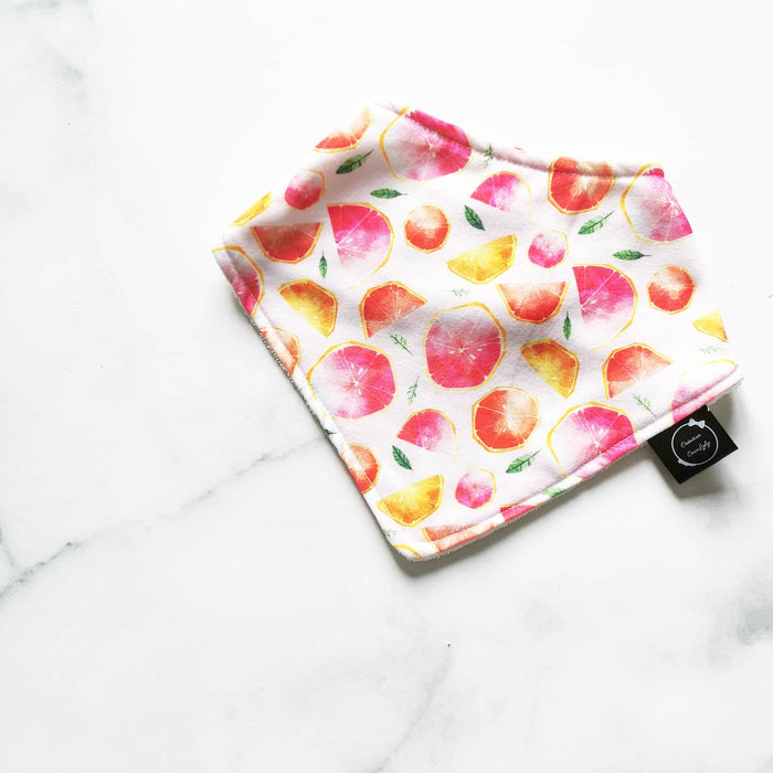 Bavoir à motits pamplemousse