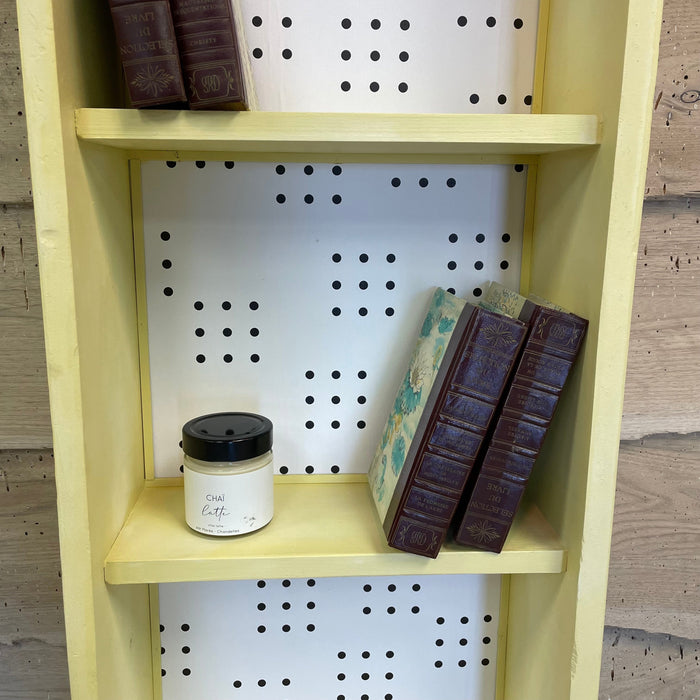 Le pointilleux • bibliothèque de rangement