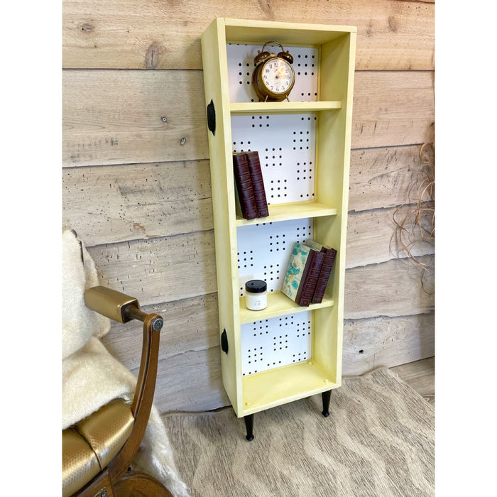 Le pointilleux • bibliothèque de rangement