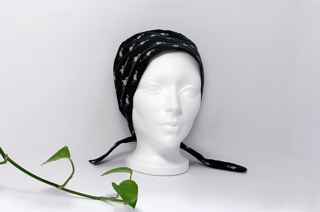 Bonnet chirurgical pour femme | flamant noir et blanc