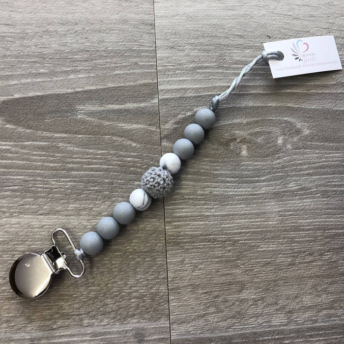 Attache-suce gris et marbre