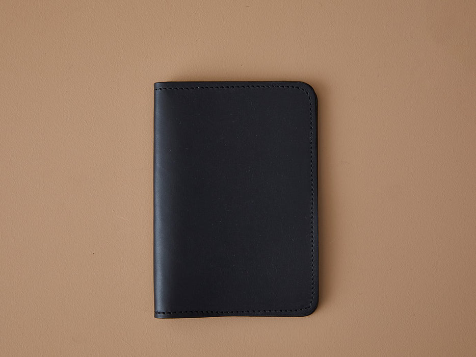 Porte-passeport en cuir noir