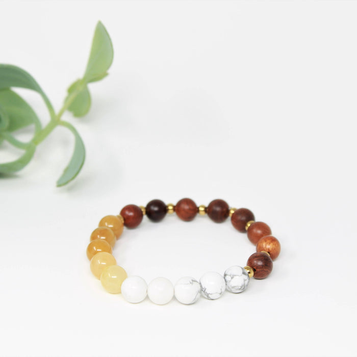 Bracelet pour femmes en pierres semi précieuses : jade jaune & howlite, bois de santal rouge, acier inoxydable doré