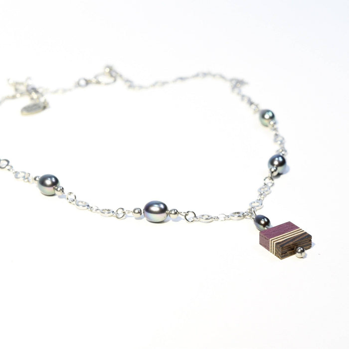 Amalgame perles bleues et bois