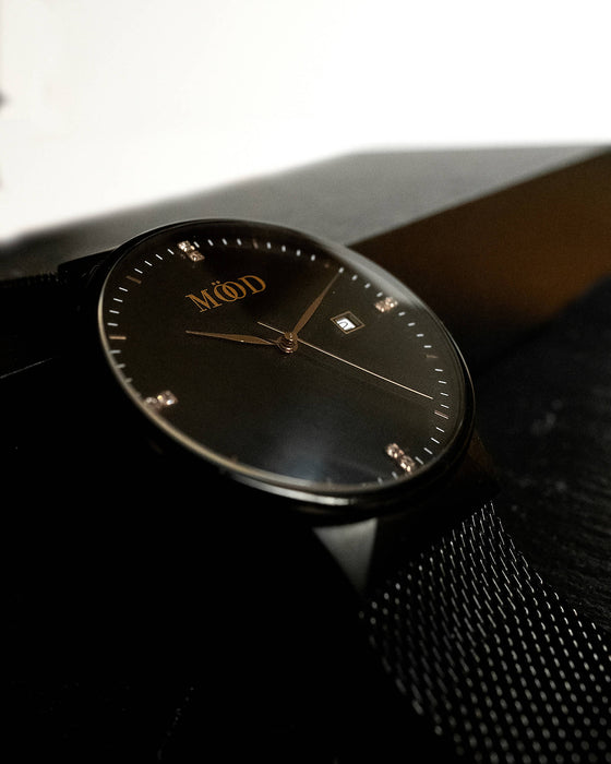 Montre pop's en acier inoxydable tissé noir