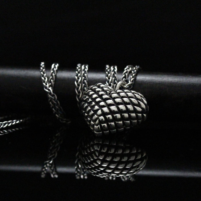 Pendentif coeur capitonné