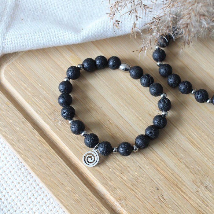 Bracelet spirale diffuseur d'huiles essentielles pour femmes et hommes en pierres de lave noire, acier inoxydable et breloque spirale