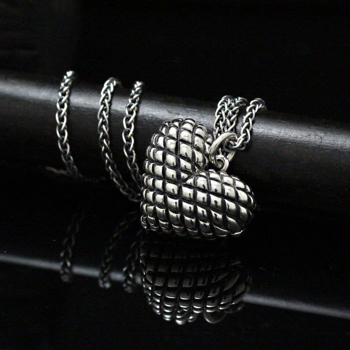 Pendentif coeur capitonné