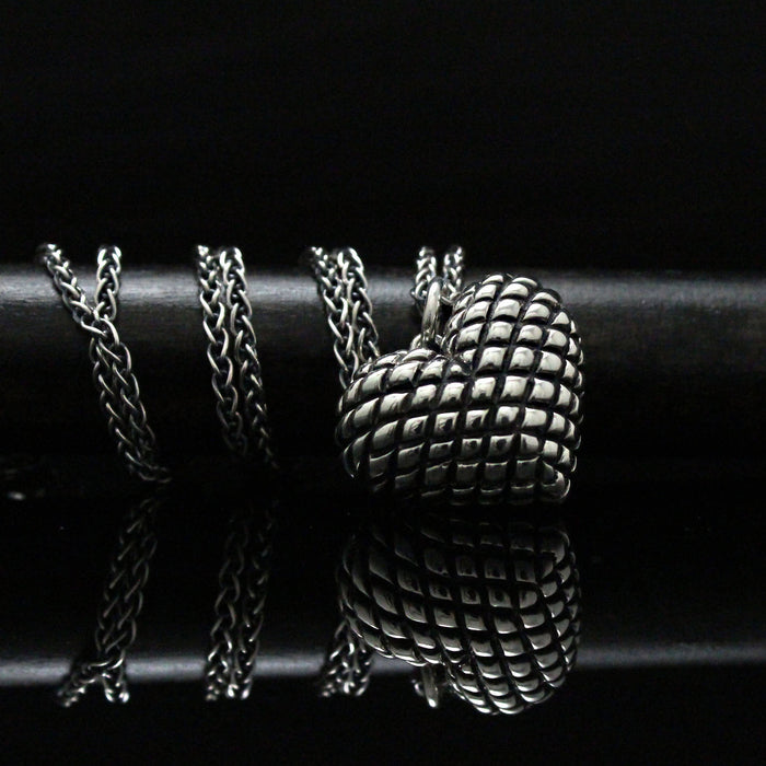 Pendentif coeur capitonné